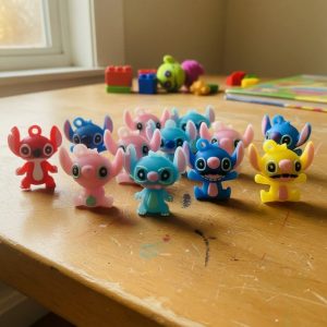 Figura Stitch para niños en cápsulas de 2'' ideal para maquinas cápsuleras chicleras vending