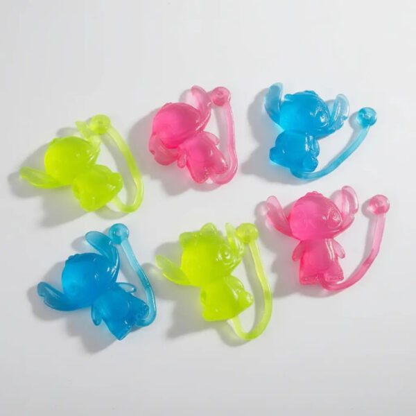 100capsulas 2 PuLG. Juguete Pegajoso Stitch Alien Para Niños